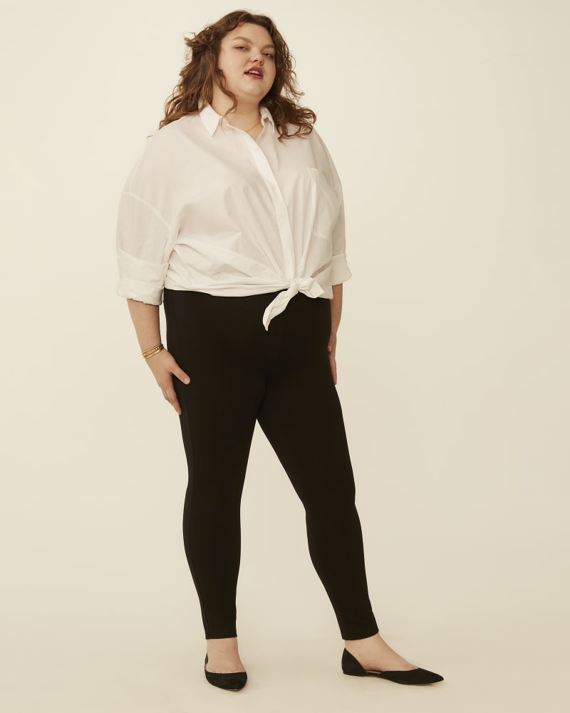 Plus size model with pear body shape wearing Eloise Ponte Skinny Pants by Ryan Wylde | Dia&Co | dia_product_style_image_id:179630